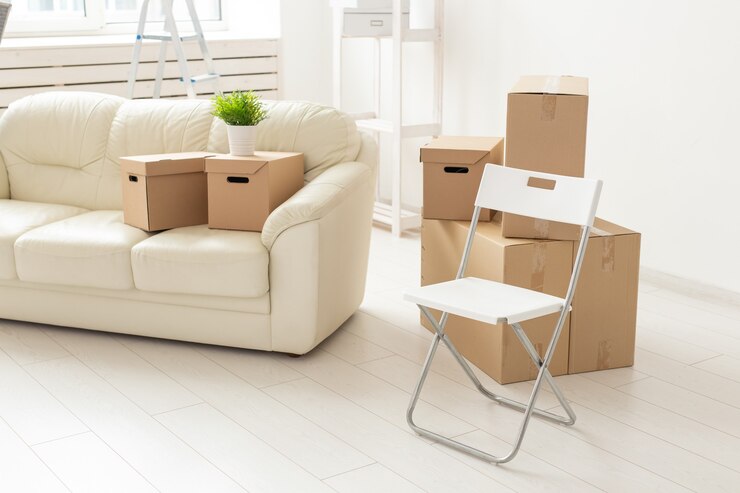 folding-chair-sofa-boxes-are-new-living-room-when-residents-move-new-apartment_230311-5371